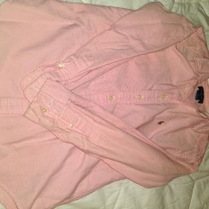 I am selling a Pink Ralph Lauren button down shirt. Size 12 in youth, worn once!